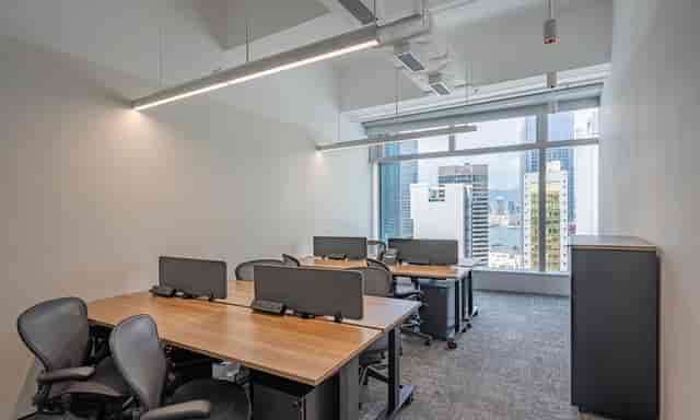 Modern outdoor meeting space with large windows for collaboration and creativity.