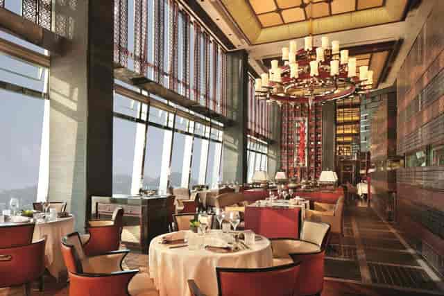 Private dining room in Hutong with elegant decor, ideal for corporate dinners and events.