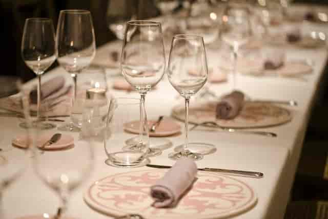 Elegant private dining room with polished glassware for upscale events.