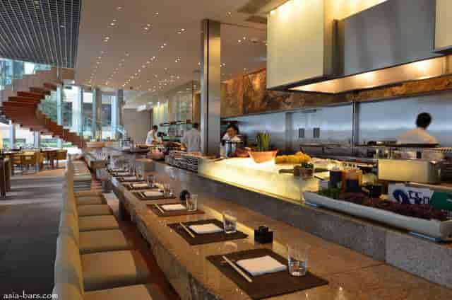 Upscale Zuma bar with sleek design, ideal for corporate dinners and private events.