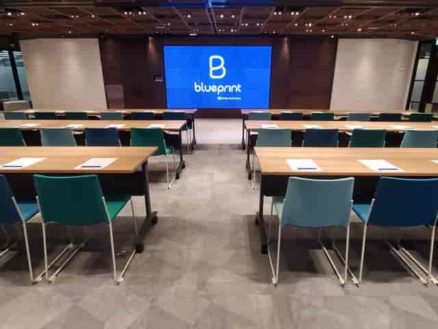 Professional meeting space with modern decor, ideal for events and presentations.