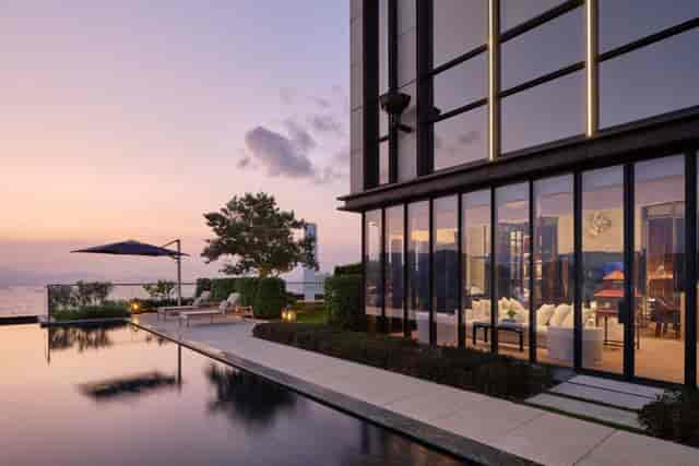 VIP room at The Glasshouse with waterfront views, ideal for upscale events and meetings.