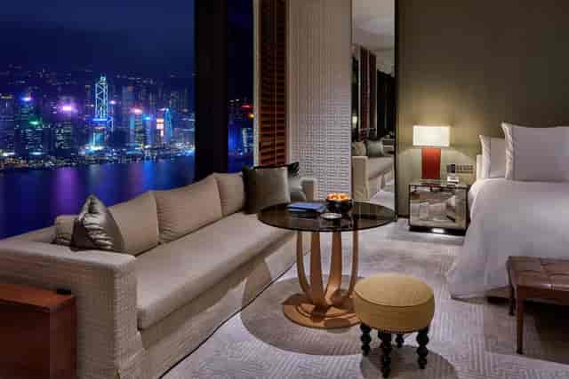 Luxurious Victoria Suite at Rosewood Hong Kong with stunning city views for VIP events.