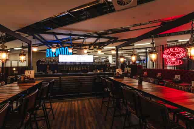 BrewDog Edinburgh Airport bar with spacious seating for networking events and gatherings.