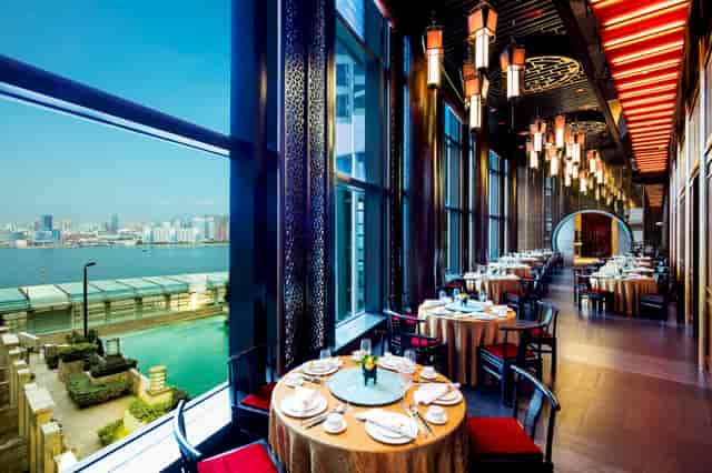 Sophisticated restaurant with skyline views, perfect for upscale events in Hong Kong.