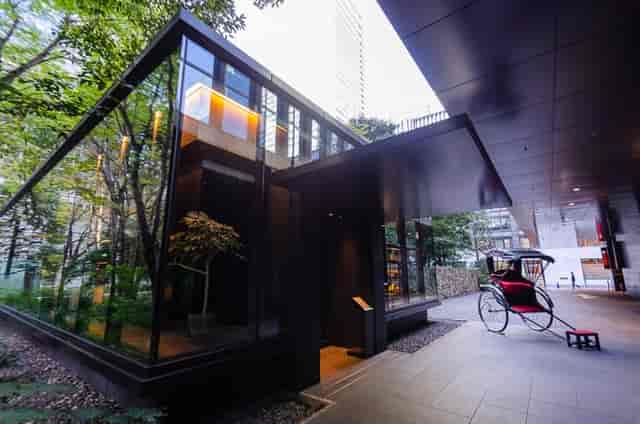 Sleek entrance of The Café by Aman, ideal for upscale events in Tokyo.