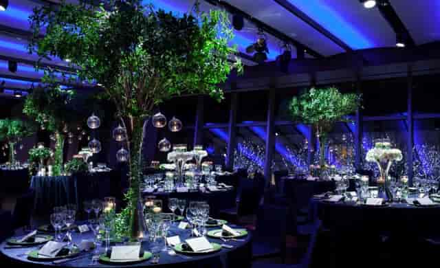 Elegant event space at Grand Hyatt Tokyo with lush greenery and ambient lighting.