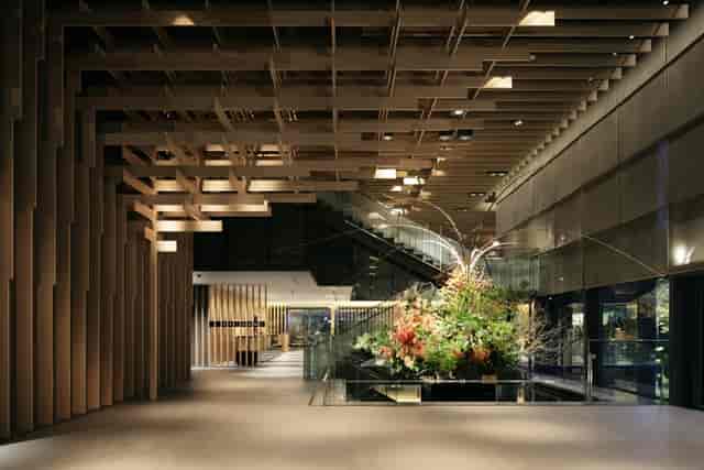 Elegant lobby at The Capitol Hotel Tokyu with floral arrangement, ideal for events and meetings.