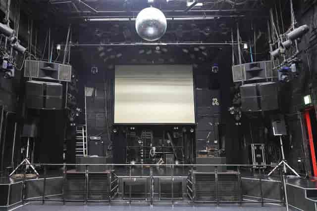 1F Lounge Floor at Club Asia: versatile event space with stage, ideal for presentations and performances.