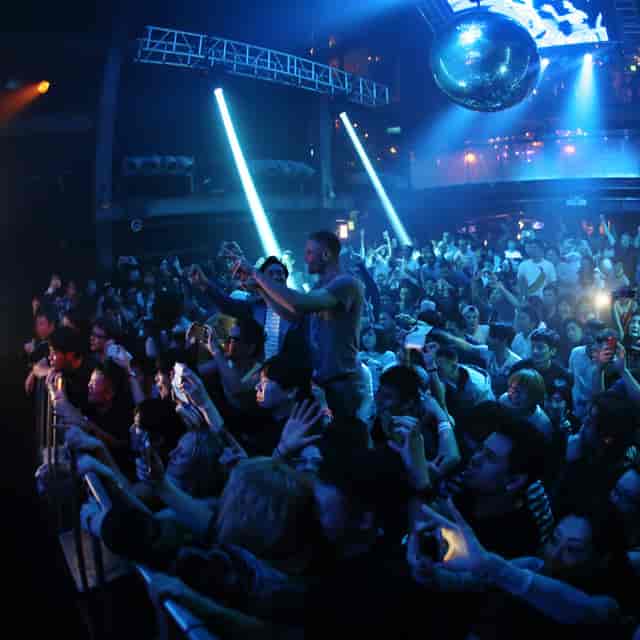 Vibrant crowd at VVIP TERRACE in WOMB, showcasing dynamic event atmosphere and engagement.