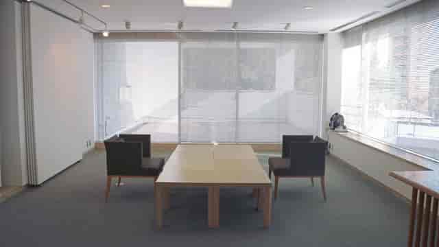 Minimalist meeting space at E-Salon, Hillside Terrace, ideal for intimate discussions.