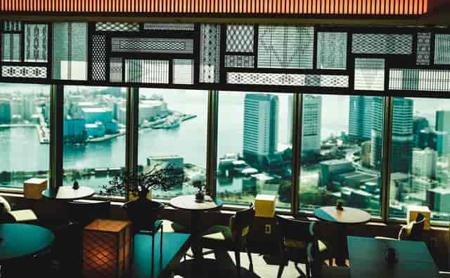 Lounge in Conrad Tokyo with panoramic city views, perfect for corporate events.