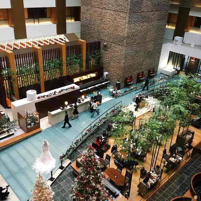 Elegant restaurant venue in Tokyo for weddings and corporate events, featuring lush greenery.