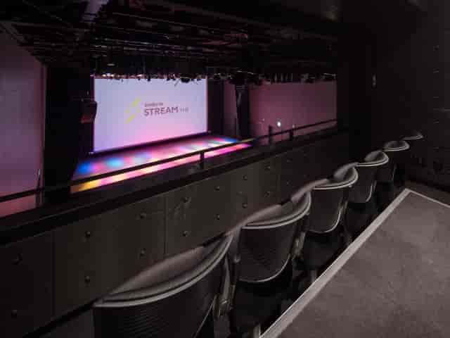 Modern SHIBUYA STREAM Hall event space with spacious stage, ideal for corporate presentations.
