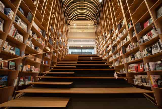 Kōdōkan library with grand staircase, perfect for book launches and creative workshops.