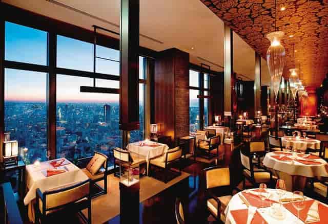 Elegant dining at Mandarin Oriental Tokyo with panoramic city views for corporate events.