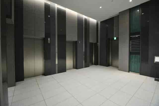 Modern elevator lobby in TKP Garden City PREMIUM Akihabara, ideal for upscale events.
