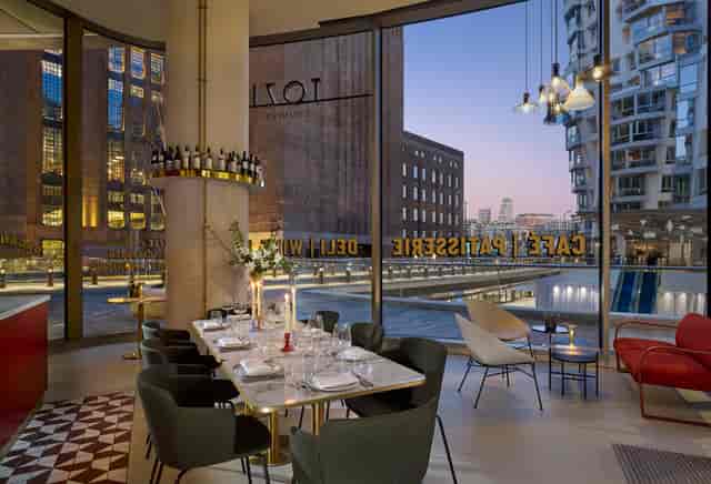 Tozi Counter at art'otel London: modern event space with urban views for upscale gatherings.