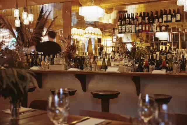 Main Dining Area at Bar du Champagne, elegant decor for intimate gatherings and networking.