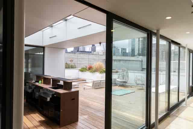 Modern event space with large windows at Sky Guild Gaming Centre for corporate and social events.