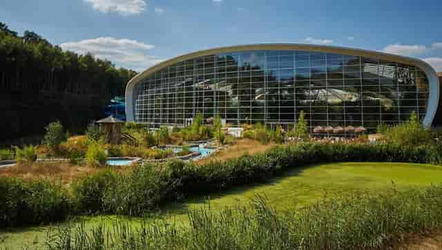 Wilstead Suite at Centre Parcs, modern venue with glass front, ideal for events and meetings.
