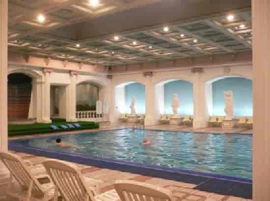 Lotte Hotel Seoul indoor pool, elegant architecture for luxury events and wellness retreats.
