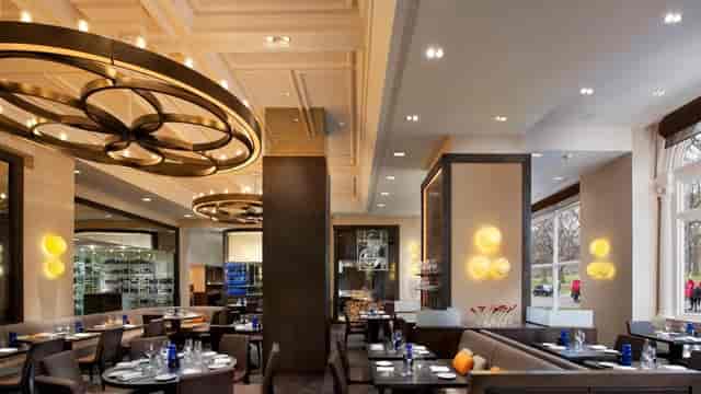 Sophisticated dining space at Dinner by Heston Blumenthal, ideal for corporate events.