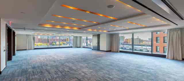Spacious conference center in InterContinental Boston with large windows for events.