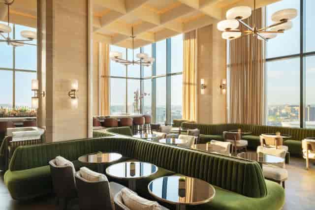 Private dining area in Raffles Boston, featuring plush seating for networking events.