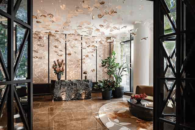 Sky Lobby at Raffles Boston with elegant floral installation, perfect for upscale events.