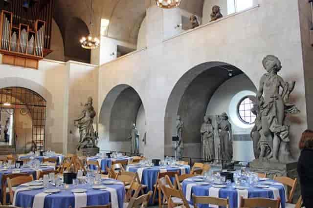 Adolphus Busch Hall: elegant event space with blue and white tables for formal gatherings.