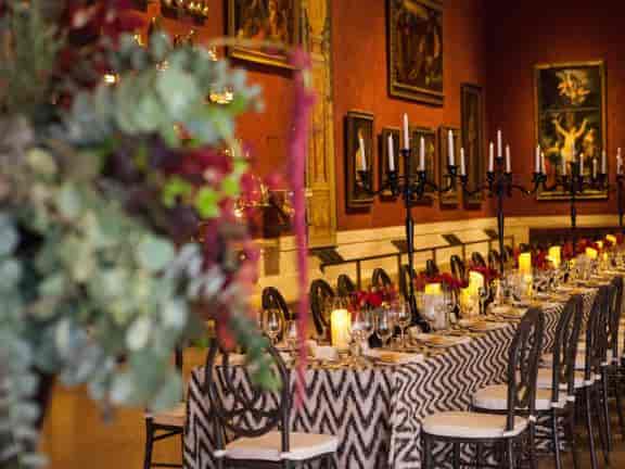 Elegant dining table with black and white tablecloth at Museum of Fine Arts Boston event.