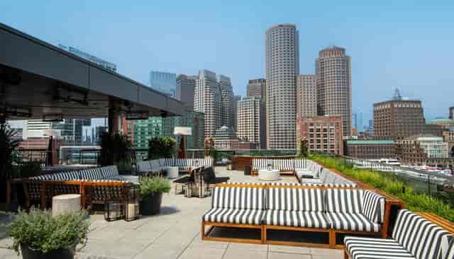 Stylish rooftop bar at The Envoy Hotel, perfect for upscale cocktail parties and receptions.