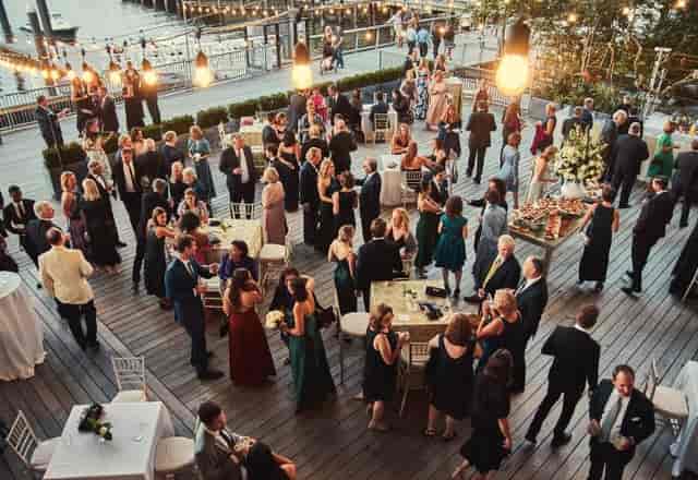 Putnam Investments Plaza gala with elegant lighting and guests enjoying a formal reception.
