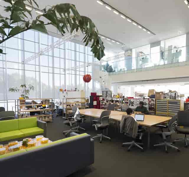 Modern MIT Media Lab Multi Purpose Room with natural light for collaborative workshops.