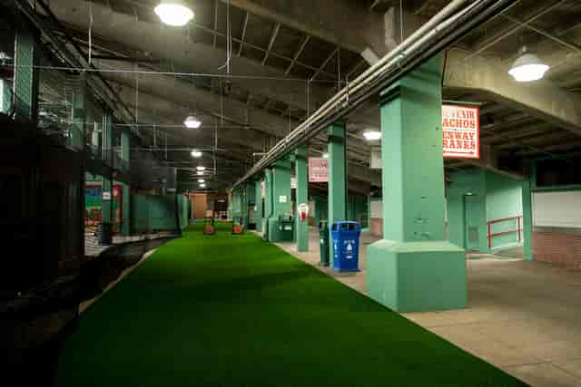 Big Concourse at Fenway Park with turf flooring, perfect for events and gatherings.