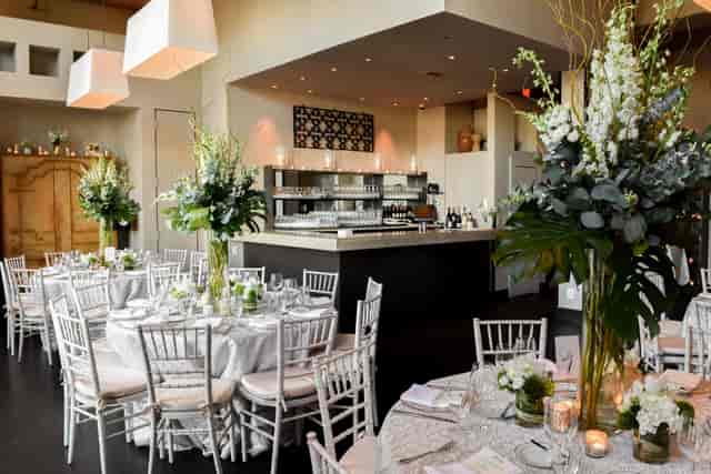 Private dining room with elegant tables, ideal for upscale weddings and corporate events.