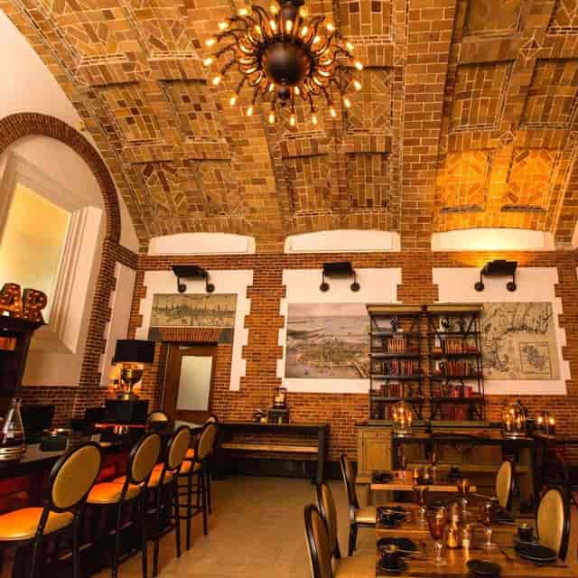 Map Room Café in Boston Library, featuring exposed brick and elegant furnishings for events.
