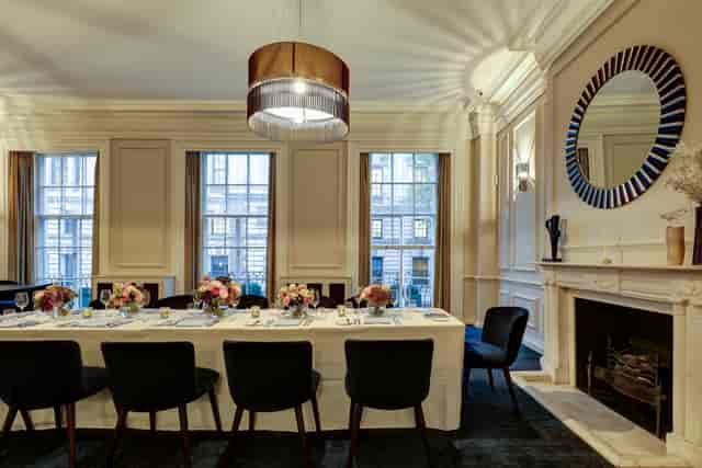 Elegant event space bar, natural light, fireplace