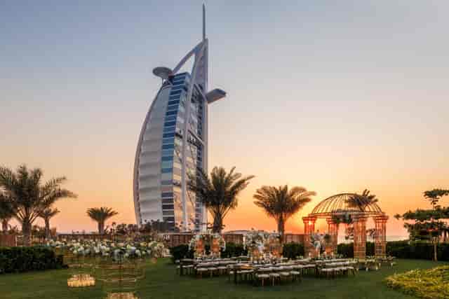 Nuska Garde outdoor event setup at Jumeirah Beach Hotel with Burj Al Arab backdrop.