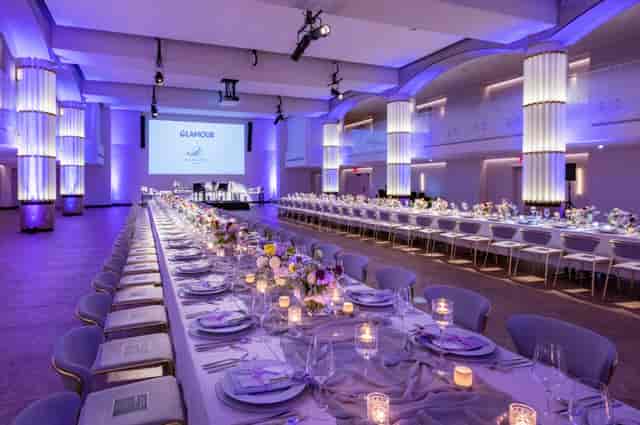 Elegant Hamilton Ballroom banquet hall with candlelit tables for corporate dinners and galas.