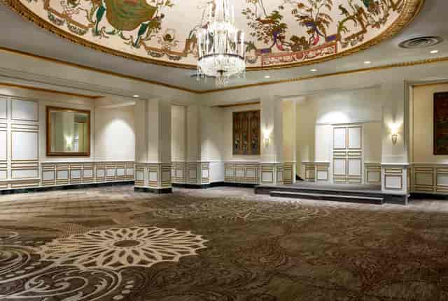 Grand Ballroom at The Mayflower Hotel with high ceiling, ideal for corporate events and gatherings.