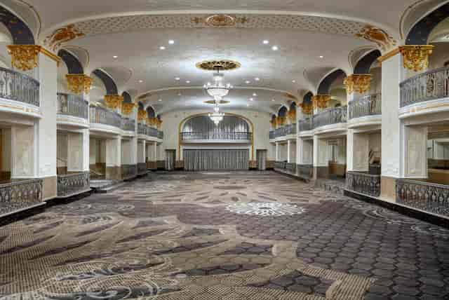 Grand Ballroom at The Mayflower Hotel with elegant chandeliers for events and conferences.