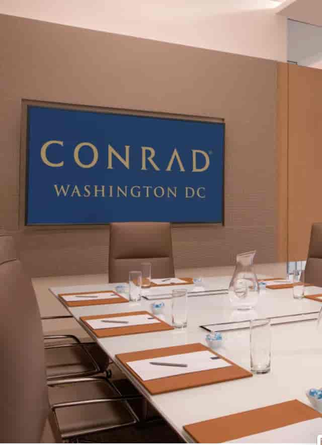 Modern meeting room at Conrad Washington DC, ideal for corporate events and conferences.