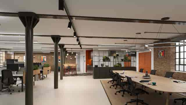 Modern meeting room in Phoenix House with oval table for collaborative sessions.