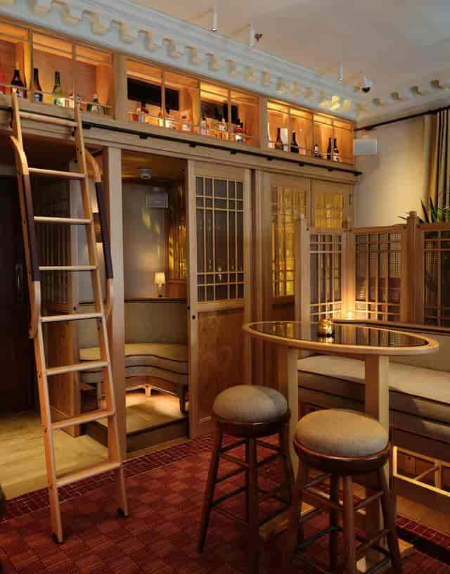Cozy meeting space at Kioku Bar with warm wood tones for team gatherings and brainstorming.