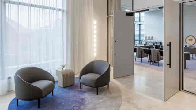Modern meeting space in The Morrow Hotel, ideal for networking and informal discussions.
