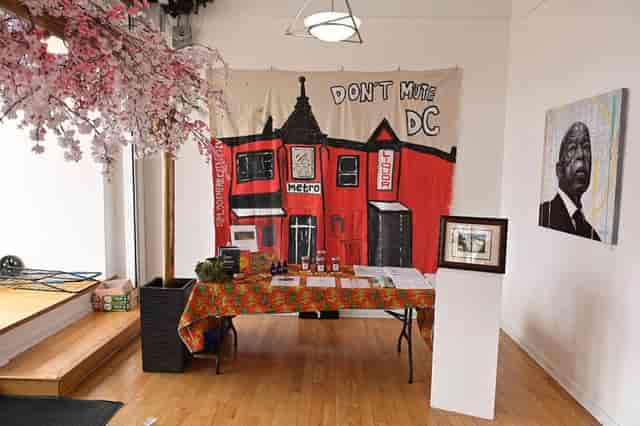 Vibrant Anacostia Arts Center community room for local events with colorful decor.