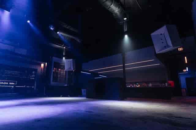 Versatile event space with modern lighting for corporate functions and private celebrations.