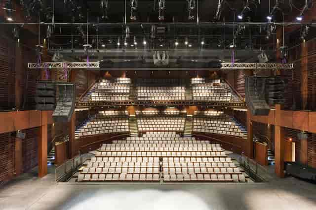 Harman Hall auditorium with tiered seating, ideal for performances and presentations.